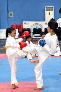 Young karate players compete during the Pakistan Independence Celebrations U-14 Kids Sports Gala organized by the Sports Department at the Sports Gymnasium