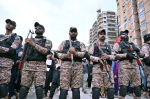 A mourning procession of the Shia community passes along M.A. Jinnah Road during the Chehlum observance commemorating the martyrdom of Hazrat Imam Hussain (AS).