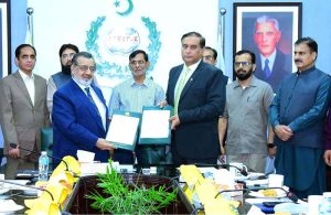 Managing Director Pakistan Bait-ul-Mal Senator Capt. Shaheen Khalid Butt and Managing Director National Telecommunication Corporation Maj. Gen. (R) Ali Farhan in a group photo along with the participants of the Document of Intent signing ceremony at PBM Headquarters