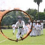 A student of The Kraty Academy University of Sargodha performs his skill during the 79th Independence Day of Pakistan organized by Sports Department University of Sargodha