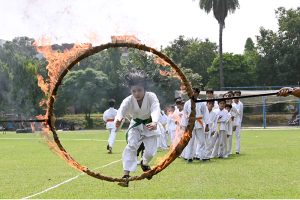 A student of The Kraty Academy University of Sargodha performs his skill during the 79th Independence Day of Pakistan organized by Sports Department University of Sargodha