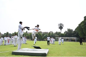 A student of The Kraty Academy University of Sargodha performs his skill during the 79th Independence Day of Pakistan organized by Sports Department University of Sargodha