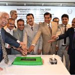 Chairman Senate, Syed Yousuf Raza Gilani along with distinguished guests, cutting a cake during a ceremony held in connection with National Minorities day at Parliament House