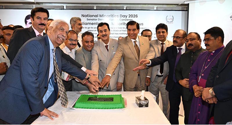 Chairman Senate, Syed Yousuf Raza Gilani along with distinguished guests, cutting a cake during a ceremony held in connection with National Minorities day at Parliament House