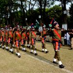 Police personnel march past during a flag hoisting ceremony organized in Commissioner Complex to celebrate Independence Day