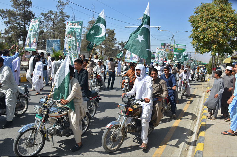 Balochistan Minister for Health, Bakht Muhammad Kakar leads an Independence Day rally as part of the 79th national day celebrations
