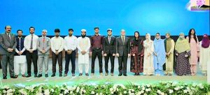 Prime Minister Muhammad Shehbaz Sharif in a group photo with high achievers at the International Youth Day Ceremony
