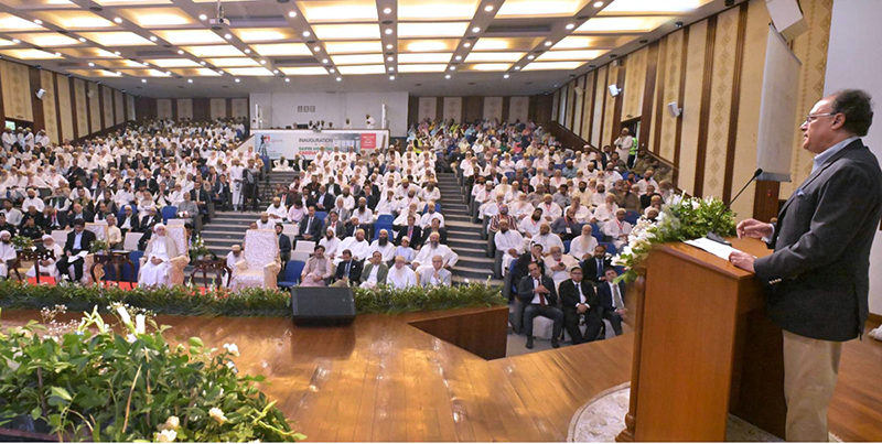 Federal Minister for Finance and Revenue, Senator Muhammad Aurangzeb, addressing the inauguration ceremony of the Saifee Hospital Cardiac Wing at Aljamea-tus-Saifiyah University Auditorium