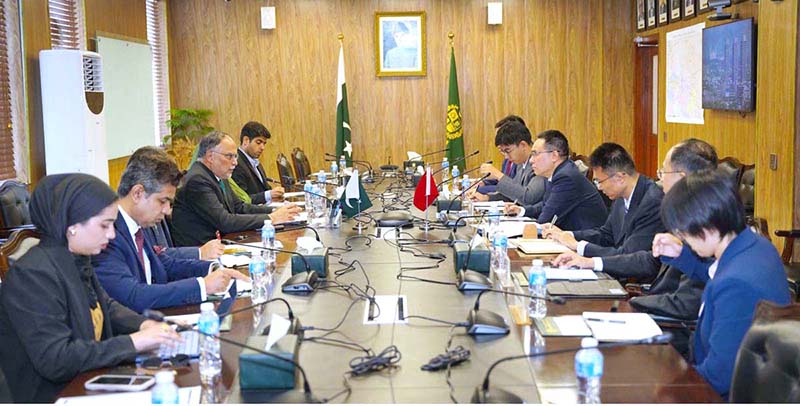 Federal Minister for Planning Ahsan Iqbal in a meeting with Liu Daxiu, Head of delegation and First Class Inspector, Party Building Research Institute, Organization Department of the CPC Central Committee and members of the visiting Chinese delegation