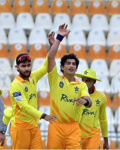 Pakistan Whites batters run between the wickets after playing a shot during the opening match of the National Champions Cup 2026–27 at Multan Cricket Stadium