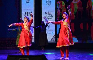 An artist performing folk dance at the launching ceremony of "Naqoosh-i-Watan" a national cultural narrative at PNCA.