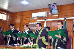 Chief Justice of the Balochistan High Court Muhammad Kamran Khan Malakhail administers the oath to newly appointed Additional Judges Muhammad Rauf Atta, Allah Dad Roshan and Abdul Qayyum Lehri during a ceremony