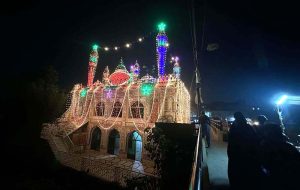 A captivating view of a mosque near Pir Wadhai, beautifully illuminated with colorful lights, which become a center of public attraction ahead of the 12th Rabi-ul-Awwal (Eid Milad-un-Nabi) celebrations.