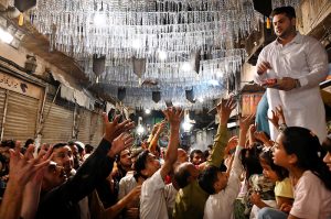 Youngsters in Arabic costumes with swords participate in a religious procession to celebrate Eid-e-Milad-un-Nabi, the birth anniversary of Prophet Muhammad (PBUH)
