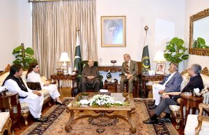 President Asif Ali Zardari talking to Prime Minister Muhammad Shehbaz Sharif, who met him at Aiwan-e-Sadr