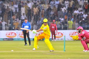 Pakistan Greens batter Omair Bin Yousuf plays an aggressive shot while chasing a 342-run target against Pakistan Gold during the final of the National Champions Cup 2026–27 at Multan Cricket Stadium