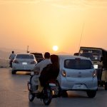 An eye-catching view of the sunset on the horizon in the city