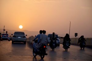 An eye-catching view of the sunset on the horizon in the city