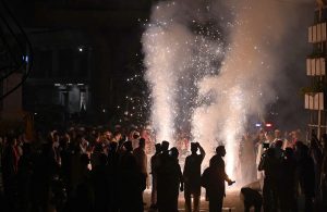 A man holds a firework in his hand during a torchlight procession (Mashal Bardar Jaloos) held on the eve of Eid Milad-un-Nabi (PBUH) to commemorate the birth anniversary of the Holy Prophet (PBUH).