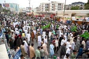 A large number of people participating in main procession of Eid Milad-un-Nabi, the birth anniversary of Holy Prophet Muhammad (PBUH) at M.A Jinnah Road near Numaish Chowrangi