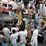 Free food are being distributing among the people participating in main procession of Eid Milad-un-Nabi, the birth anniversary of Holy Prophet Muhammad (PBUH) at M.A Jinnah Road near Numaish Chowrangi