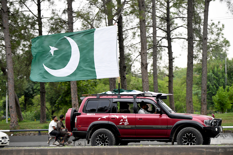 National flag displayed on a vehicle as the citizens mark the 79th Independence Day celebrations, observed across the country with traditional zeal and fervor