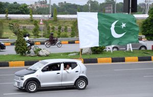 National flag displayed on a vehicle as the citizens mark the 79th Independence Day celebrations, observed across the country with traditional zeal and fervor