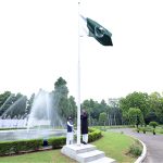 Charge d’ Affaires, Saad Ahmad Warraich, hoisting the national flag at the flag-hoisting ceremony at the Pakistan High Commission