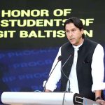 GB Minister for Education Aman Ali Amir addresses a ceremony held for the distribution of cheques under the “Chief Minister Honhaar Scholarship” programme at Karakoram International University