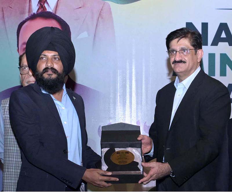 Sindh Chief Minister Syed Murad Ali Shah presents shields to distinguished members of minority communities in recognition of their outstanding contributions and achievements in their respective fields during the National Minorities Day celebration organised by the Provincial Minorities Affairs Department at the Arts Council
