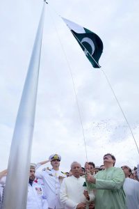Sindh Chief Minister Syed Murad Ali Shah, accompanied by Governor Sindh Syed Muhammad Nihal Hashmi and members of the provincial cabinet, hoists the national flag at Mazar-e-Quaid during the Independence Day ceremony commemorating Pakistan's 79th Independence Day