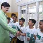Sindh Chief Minister Syed Murad Ali Shah interacts with a child undergoing rehabilitation from drug addiction during his visit to the Aas Foundation in Haji Sukhio Goth on the occasion of Independence Day