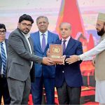 Prime Minister Muhammad Shehbaz Sharif presenting awards to the members of Religious Minorities of Pakistan who contributed towards the sustained benefits of the society