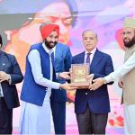 Prime Minister Muhammad Shehbaz Sharif presenting awards to the members of Religious Minorities of Pakistan who contributed towards the sustained benefits of the society