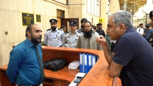 Interior Minister visits Jinnah Int'l Airport, meets passengers, reviews immigration Process