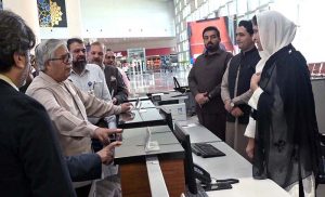 Airport officials brief members of the Federal Ombudsman’s inspection team about airport operations during their visit to Islamabad International Airport.