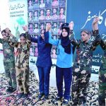 Students performing in tableau during a ceremony on the occasion of the Defense Day celebrations at Fort