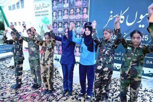 Students performing in tableau during a ceremony on the occasion of the Defense Day celebrations at Fort