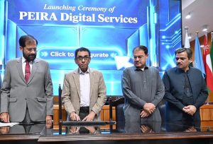 Federal Minister for Education and Professional Training Dr. Khalid Maqbool Siddiqui addresses the launching ceremony of the PEIRA Digital Service: Paperless Regulation & Public Facilitation Initiative at the FBISE auditorium.