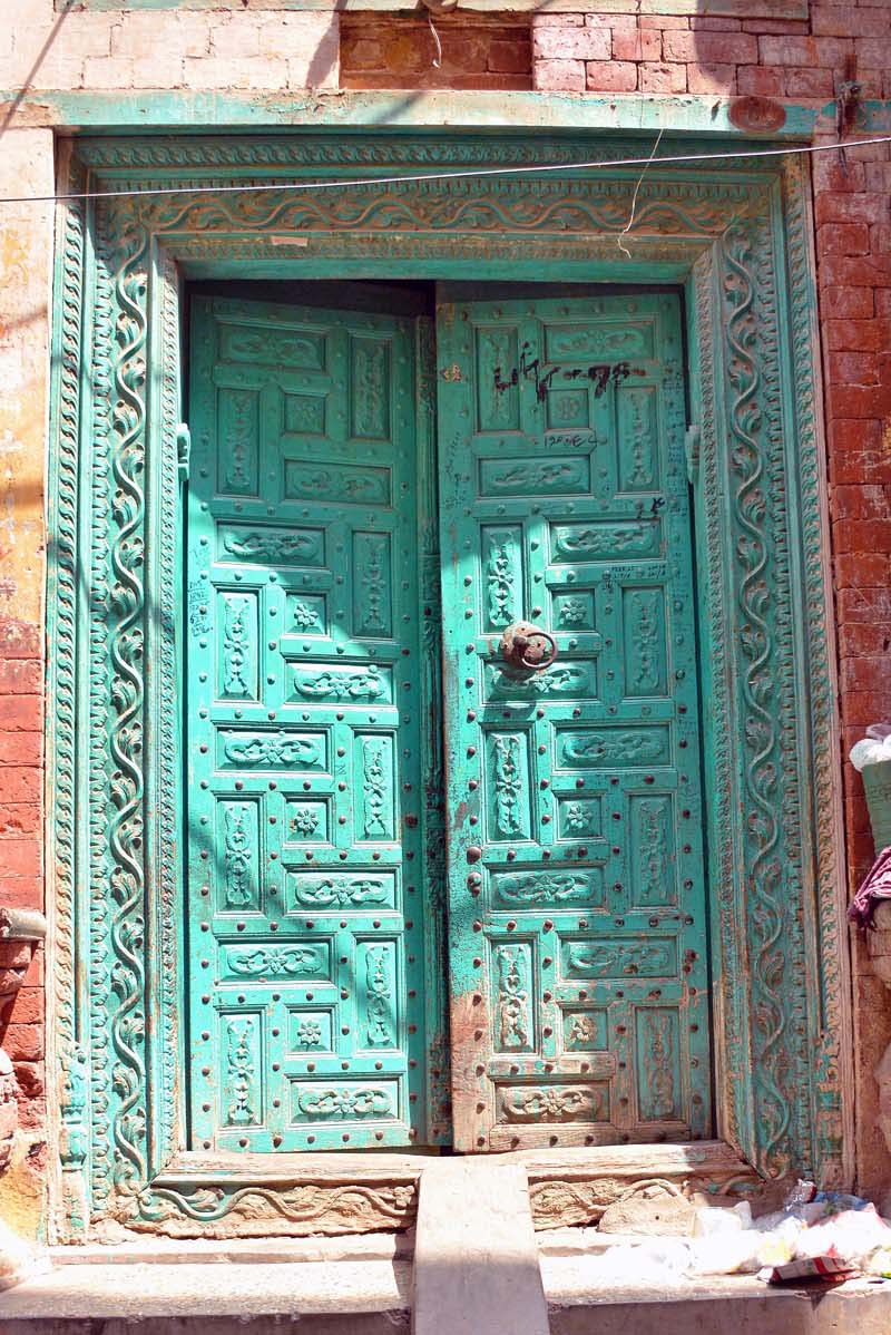 In the narrow streets of interior Multan, where centuries-old houses still preserve the city’s architectural character, hundreds of carved wooden doors continue to stand as silent witnesses to a bygone era of craftsmanship. Many of these doors are believed to be a century old or even older. Made by local craftsmen from durable indigenous trees, they were designed not merely as entrances to homes but as strong, decorative structures reflecting the skill, taste and economic standing of their owners. (Match the photo with APP Feature slugged “Handcrafted wooden doors preserve Multan’s heritage” already been released