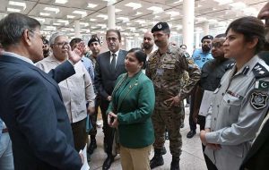 Airport officials brief members of the Federal Ombudsman’s inspection team about airport operations during their visit to Islamabad International Airport.