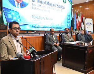 Federal Minister for Education and Professional Training Dr. Khalid Maqbool Siddiqui addresses the launching ceremony of the PEIRA Digital Service: Paperless Regulation & Public Facilitation Initiative at the FBISE auditorium.