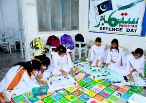 Students of a local private school paint pictures themed on Defence Day ahead of September 6.