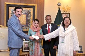 Khyber Pakhtunkhwa Governor Faisal Karim Kundi meets with Nurse Razia Noreen and presented her with a cash award of 100,000 rupees and a special shield. Nurse Razia Noreen had saved the life of an infant during a fire incident in the nursery at PIMS. Minority leader Samuel Pyara and PIMS Deputy Chief Nursing Officer Shazia were also present at the ceremony held in the federal capital.