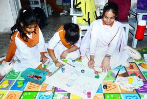 Students of a local private school paint pictures themed on Defence Day ahead of September 6.