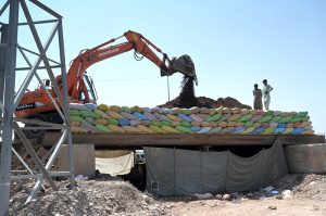 Heavy machinery and construction crews work on the rehabilitation, expansion and dualization of the eastern service road along the Islamabad Expressway, as part of a Capital Development Authority (CDA) project to upgrade the 8.5-kilometre stretch from Faizabad Interchange to Gulberg Greens into a six-lane carriageway