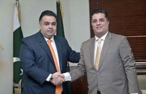 Syrian Ambassador to Pakistan Ramez Alraee shakes hands with Minister of State/Special Assistant to the Prime Minister on Digital Media Fahd Haroon at the PM’s Office.