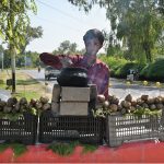 A vendor selling Sweet potatoes at his roadside setup in the Federal Capital