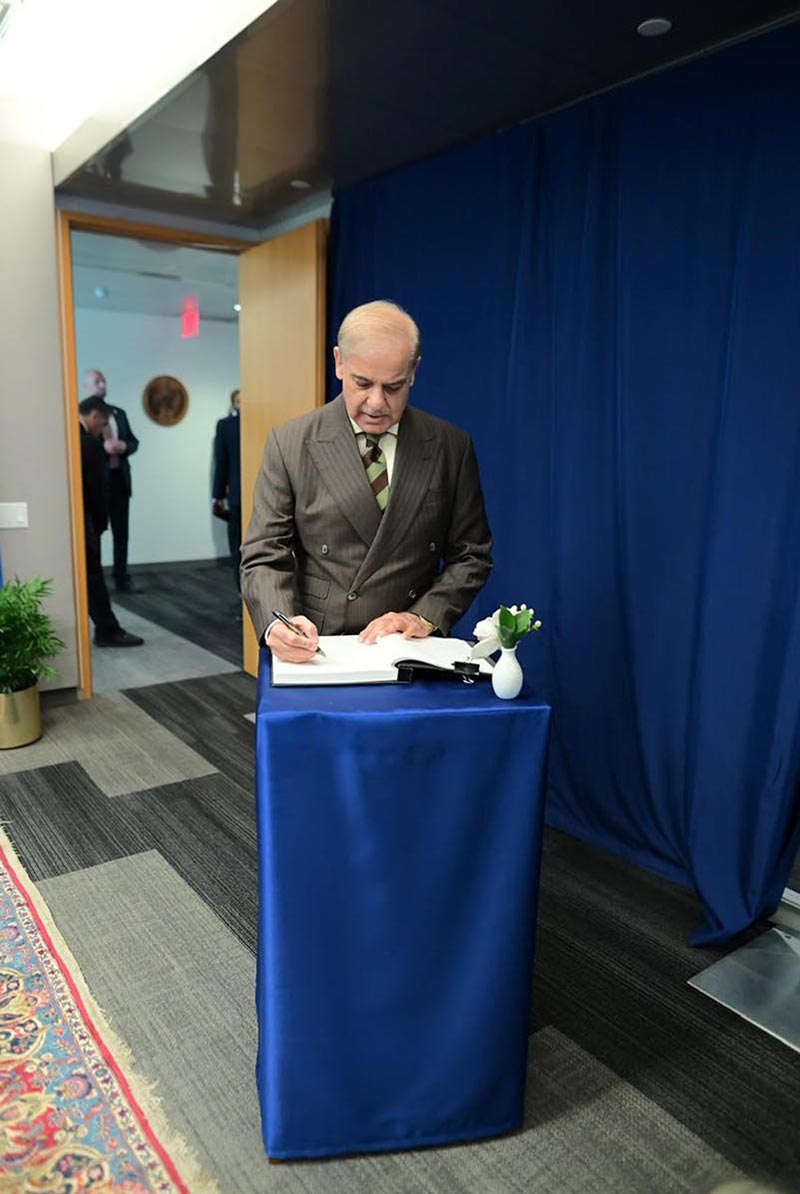 Prime Minister Muhammad Shehbaz Sharif writing his remarks in the visitors' book at the office of the United Nations Secretary-General. New York