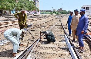 Railway workers are busy repairing railway tracks near Railway Station.